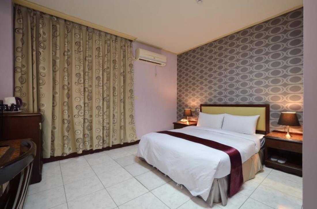 均英商務飯店(Jiuning Business Hotel)